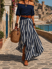 Ensemble femme : haut bleu épaules dénudées, jupe longue rayée bleu/blanc, ceinture