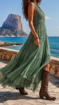 Robe longue sans manches vert, jupe évasée à volants, fente sur le devant