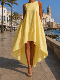 Robe jaune sans manches, évasée, ourlet asymétrique et tombé fluide