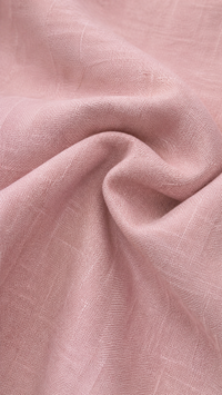 Tissu lin rose clair texturé, gros plan