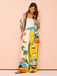 Ensemble de plage à imprimé tropical : pantalon ample multicolore et haut blanc