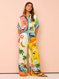 Ensemble de plage à imprimé tropical : pantalon ample jaune et haut blanc sans manches