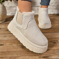 Bottes douillettes blanches à enfiler, empiècement élastique et bordure duveteuse