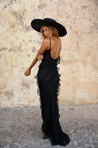 Robe longue noire à volants, dos nu avec bretelles croisées