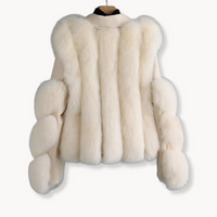 Veste en cuir et fourrure crème, dos évasé avec panneaux et patte à la taille