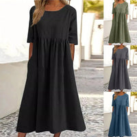 Robe midi noire en lin-coton, encolure ronde, manches courtes, jupe évasée.