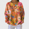 Salomé - Pull orange à motif floral
