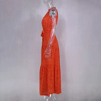 Robe longue d’été rouge à pois blancs, sans manches, jupe fluide.