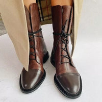 Bottes classiques marron à lacets, tige mi-mollet, bout arrondi, semelle crantée