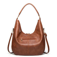 Sac à bandoulière classique en cuir marron, poche zippée et franges décoratives