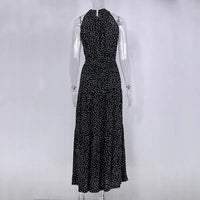 Robe longue d’été noire à pois blancs, col montant sans manches, coupe évasée