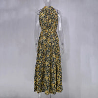 Robe longue d’été sans manches à motif floral jaune et noir, coupe évasée.