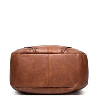 Sac à bandoulière classique en cuir marron, vue du dessus avec coutures arrondies