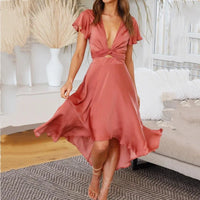 Robe midi d’été rouge, nœud à la taille et ourlet volanté, coupe fluide.