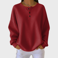 Pull en maille gaufrée rouge, col avec 3 boutons