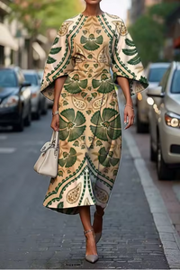 Robe midi Celestiva imprimé feuilles vertes sur fond beige, manches amples, encolure ronde