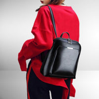Sac à dos classique noir en cuir, anses et bretelles avec boucle métal