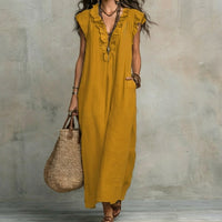 Robe longue sans manches en lin texturé jaune, encolure V boutonnée, fronces au col