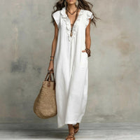 Robe longue sans manches en lin texturé blanc, encolure V boutonnée, poches latérales