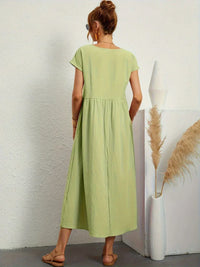 Robe midi fluide vert menthe, manches courtes, taille froncée, vue de dos