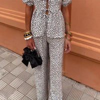 Ensemble deux pièces noir et blanc à pois, pantalon long taille élastique