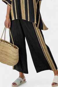 Haut rayé oversize noir et beige, ourlet courbe, coupe ample
