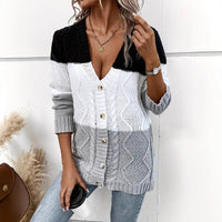 Cardigan ouvert en maille épaisse bicolore noir et blanc, boutons sur le devant.