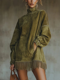 Robe col roulé suède vert, manches bouffantes longues, ourlet à franges
