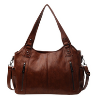 Sac cabas en cuir marron, anses en cuir avec rivets, bandoulière, fermetures zippées
