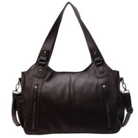 Sac cabas en cuir marron, anses avec rivets, bandoulière, poches zippées latérales