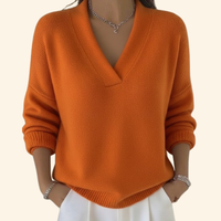 Pull en maille orange à encolure V, manches longues, bord-côtes.