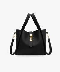 Sac à main en cuir texturé noir, poignées hautes, bandoulière, fermeture centrale