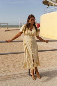 Robe midi jaune à imprimé floral, encolure V, manches courtes, volume léger à la marche