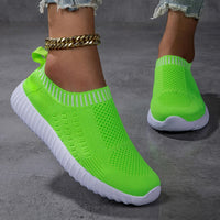 Baskets orthopédiques vert fluo en maille, semelle blanche, bord tricoté ton sur ton