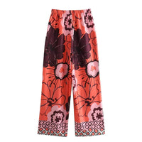 Pantalon large rouge à taille élastique, motifs floraux, jambes fluides