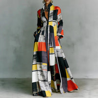Robe longue boutonnée à grands carreaux abstraits noir, blanc, rouge et jaune, manches longues