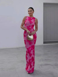 Robe longue sans manches rose fuchsia à motifs floraux, coupe près du corps