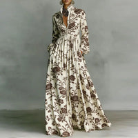 Robe longue boutonnée blanche à motif floral brun, col ouvert, manches longues