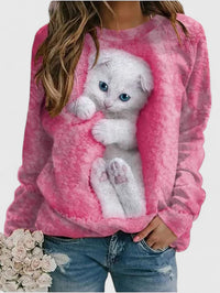 Sweat en tissu peluche rose, motif chat blanc aux yeux bleus sur le devant.