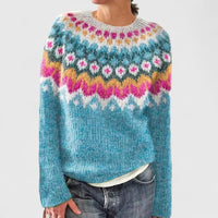Pull jacquard manches longues bleu clair, motif multicolore en points et zigzags.