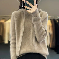 Sweat à capuche moelleux beige clair, manches longues et cordons de serrage