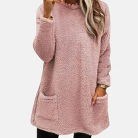 Pull long à poches, manches longues, tissu texturé rose