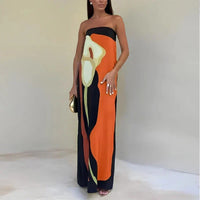 Robe longue bandeau, imprimé abstrait noir et orange avec touches beige