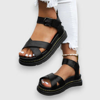 Sandales orthopédiques noires à brides croisées et boucle cheville.