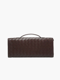 Sac tressé marron foncé, motif entrelacé, fermeture sur le dessus, bandoulière non visible