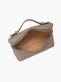 Sac à main compact beige à ouverture zippée, poche intérieure visible