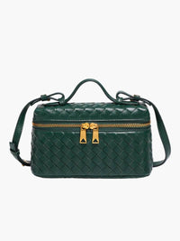 Sac à main mini boîte en cuir tressé vert foncé, bandoulière, fermeture zippée dorée.