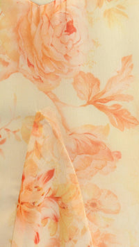 Tissu de robe imprimé floral orange et blanc avec motifs floraux