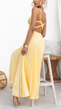 Robe longue plissée jaune dos nu avec bretelles croisées et jupe plissée