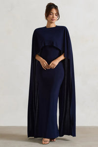 Robe longue bleu marine, encolure ample et pan drapé, manches chauve-souris